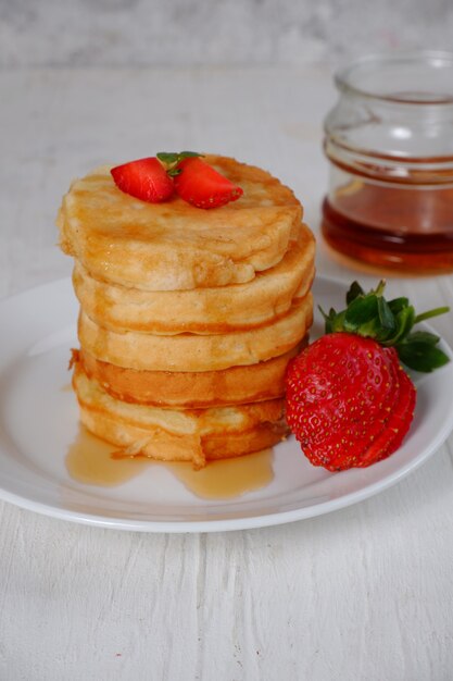 pancake with strawberry and syrup