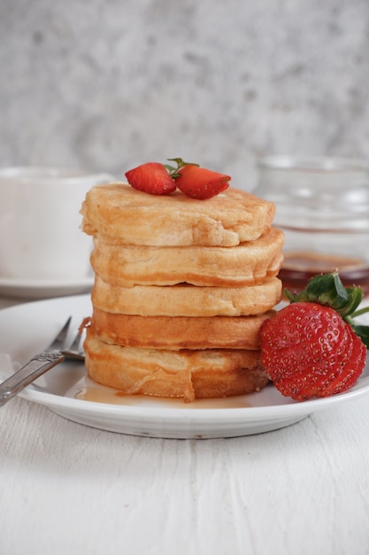 pancake with strawberry and syrup