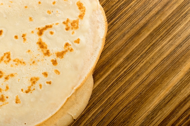 Pancake on wooden table