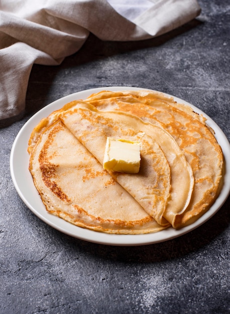 Pancakes crepes on dark 