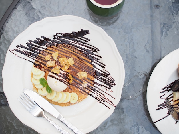 pancakes in honey syrup and ice cream