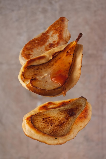 Pancakes with baked pears flying food