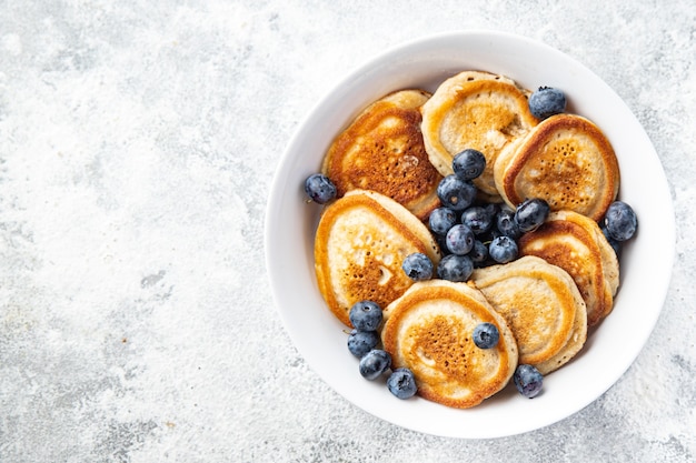 Pancakes with blueberries fresh breakfast sweet dessert fresh portion ready to eat meal snack