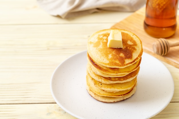 pancakes with butter and honey