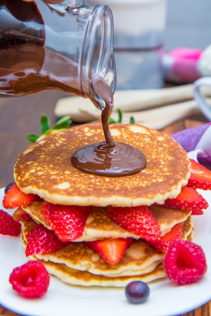 pancakes with chocolate and fresh berries