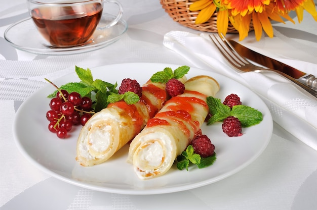 Pancakes with cottage cheese with raspberry syrup