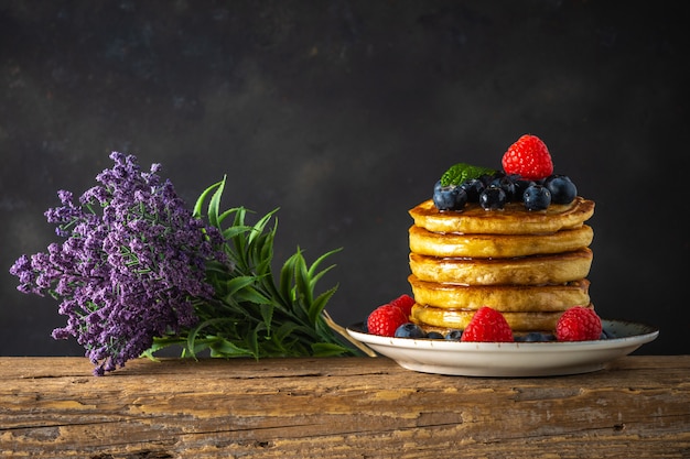 Pancakes with fresh berries and lavander