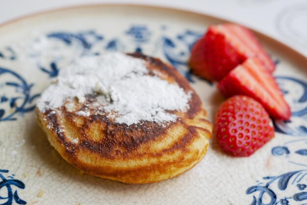 Pancakes with fresh berries on a plate