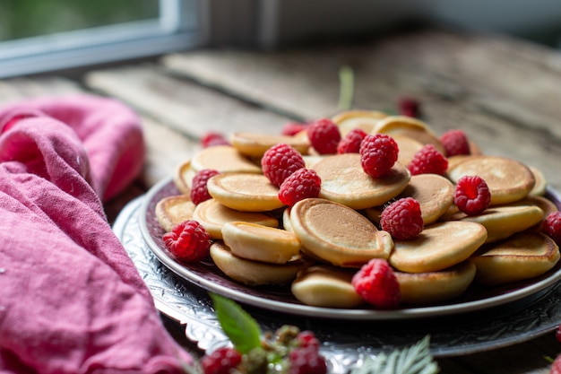 pancakes with fruits on a plate