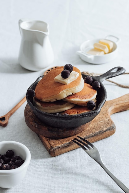 Pancakes with honey and berries