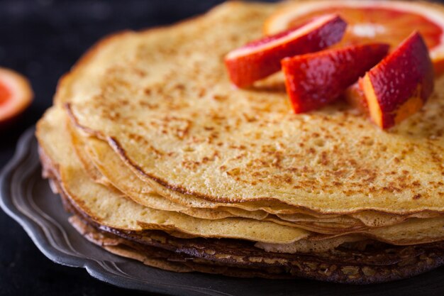 Pancakes with jam of red oranges