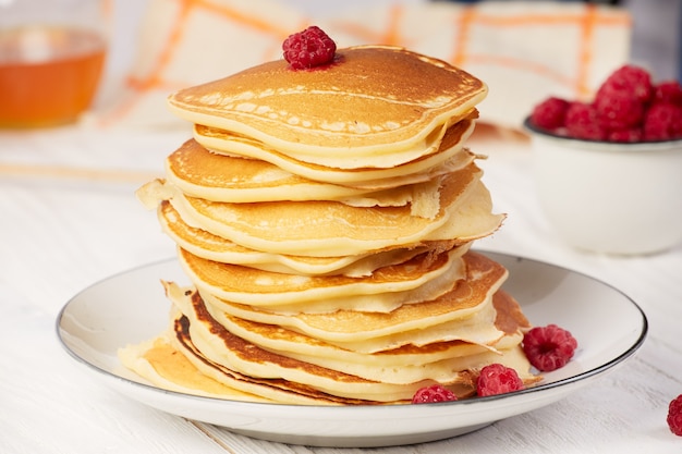 Pancakes with raspberry closeup.