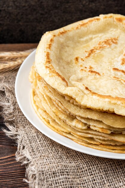 Pancakes on wooden table