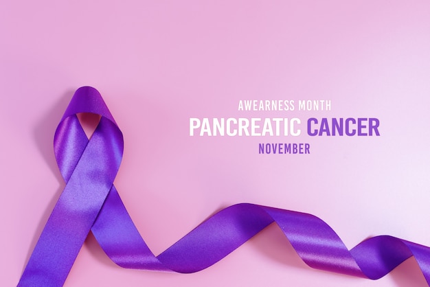 Photo pancreatic cancer awareness ribbon purple ribbon