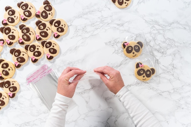 Panda shaped shortbread cookies with chocolate icing