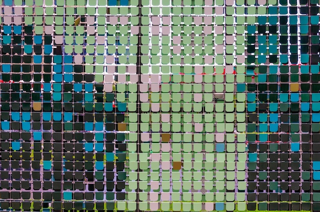 A panel made of colored metal squares.