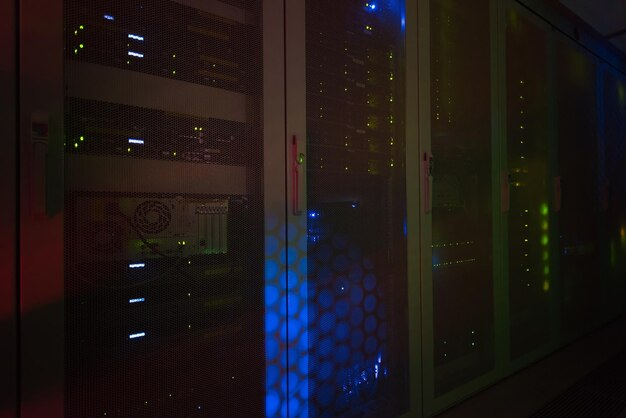 Photo panel modern communication equipment with light from the display at data center in the server room