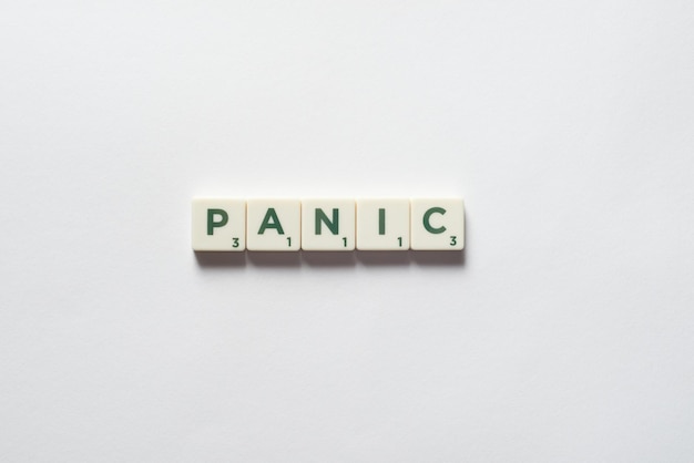 Panic formed of scrabble blocks