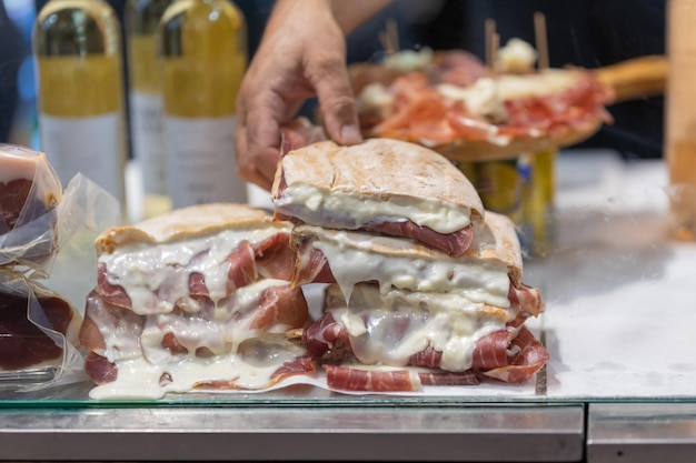 Panini with prosciutto and cheese at the fair