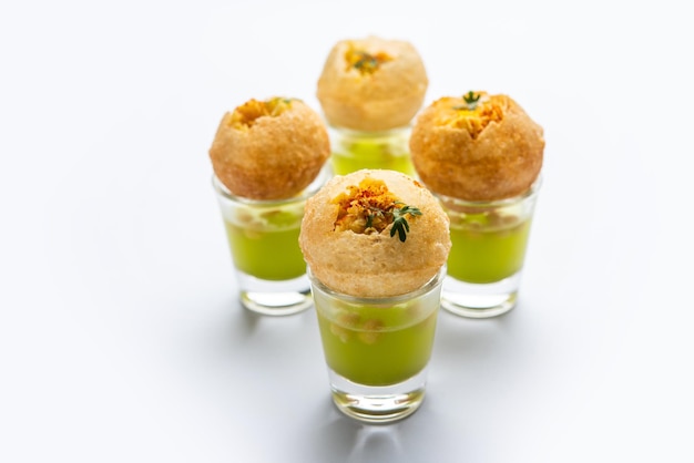 Premium Photo | Panipuri shot or golgappa shots different flavours of ...