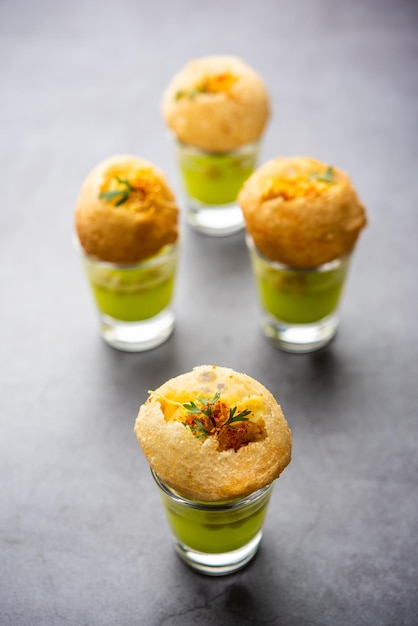 Premium Photo | Panipuri shot or golgappa shots different flavours of ...