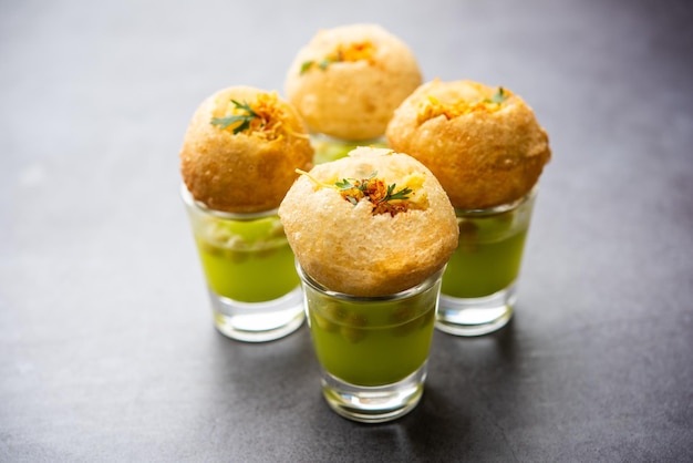 Premium Photo | Panipuri shot or golgappa shots different flavours of ...