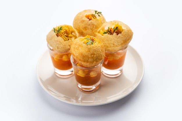 Premium Photo | Panipuri shot or golgappa shots different flavours of ...