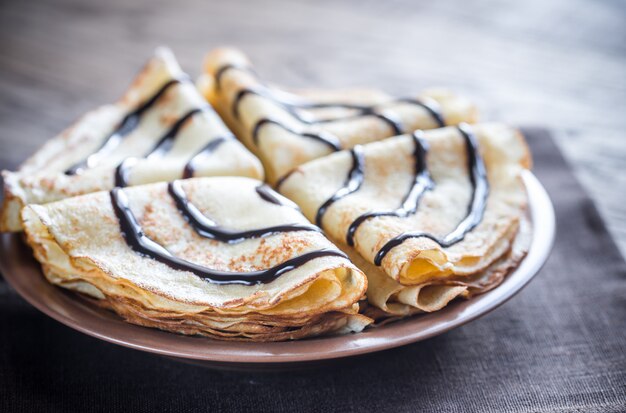 Foto pannenkoeken met chocolade topping