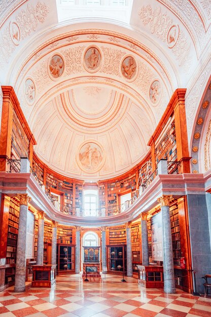 Photo pannonhalma archabbey hungary pannonhalma abbey library interior in hungary unesco world heritage site discover the beauties of hungary interior of the library