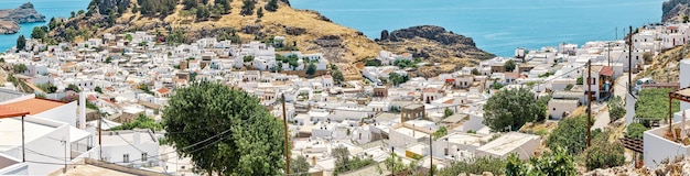 Panorama of ancient Lindos city with white houses on Rhodes island