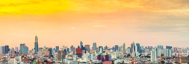 Panorama of Bangkok skyline at sunset, Thailand.