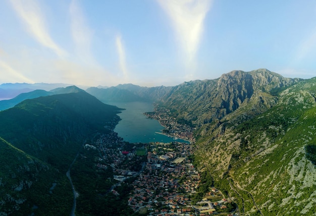 Panorama of the bay of kotor with beaches and hotels and the adriatic sea against the backdrop of su