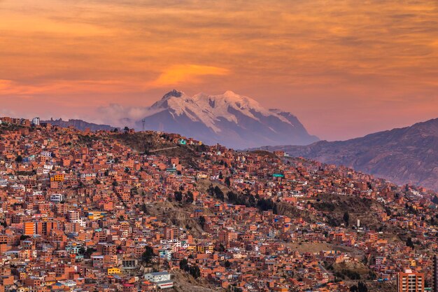 Panorama of the city of La Paz with mountain of Illimani on the background Bolivia