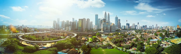 Photo panorama cityscape view in the middle of kuala lumpur city center day time malaysia