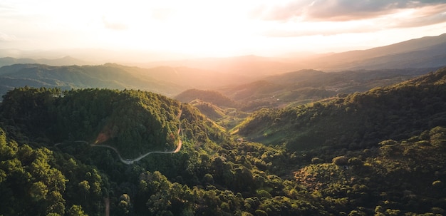 Panorama mountain road into a rural village form above