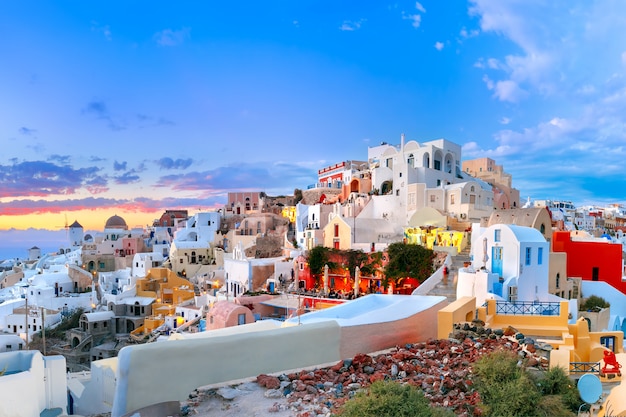 Panorama of Oia or Ia at sunset, Santorini, Greece