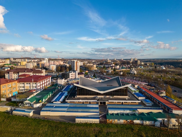 Panorama of the old European city with cozy small houses churches and monasteries Drone flight over the historical center of the city City in fog autumn landscape