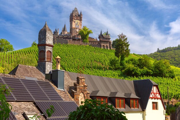 Panorama of reichsburg castle and vineyard in cochem beautiful town on moselle river germany