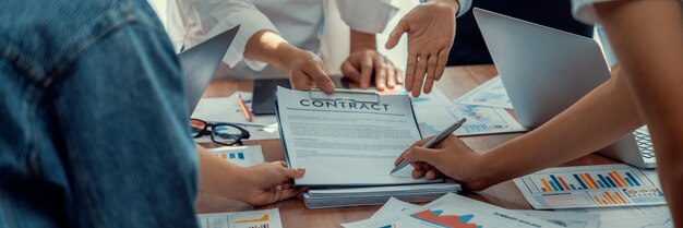 Panorama shot hand signing signature on legal contract Scrutinize