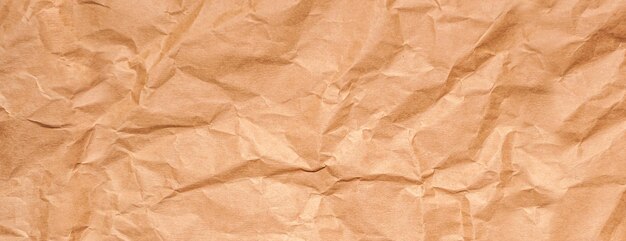 Panorama texture of old yellow crumpled paper