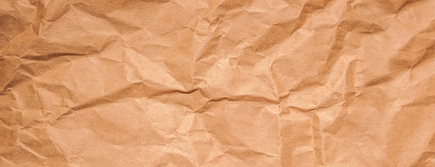 Panorama texture of old yellow crumpled paper