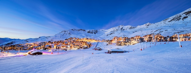 Panorama of val thorens by night, alps mountains, france