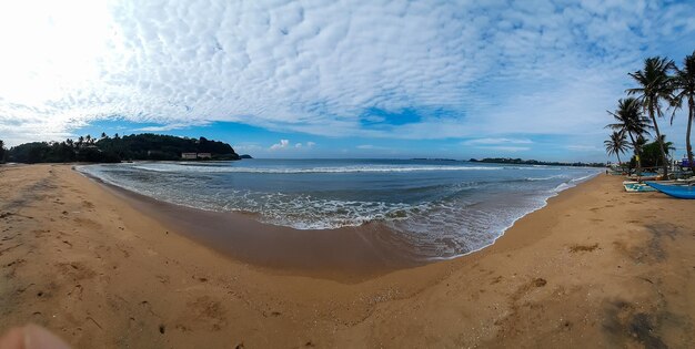 Foto panorama van zonnig zandstrand tropisch oceaanstrand