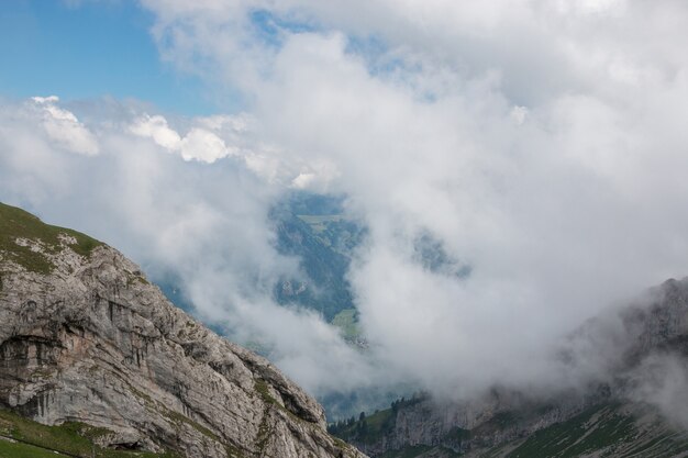 Panorama view of mountains scene from top Pilatus Kulm in national park Lucerne, Switzerland, Europe. Summer landscape, sunshine weather, dramatic blue sky and sunny day