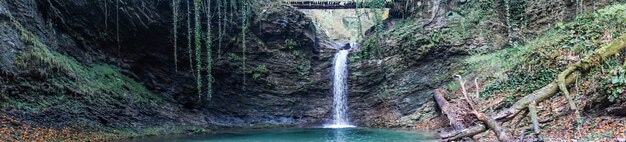 Panorama of Waterfall Azhek, Hiking in forest of Sochi, Russia.