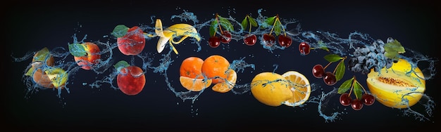 panorama with fresh fruits in the water kiwi peach banana tangerine cherry lemon melon a delicious dessert for halloween christmas and new year