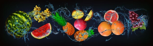 panorama with fruits in water juicy grapes grapefruit pineapple apple watermelon a range of tastes and vitamins for people
