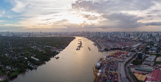 Panoramic aerial view over Bangkok city with Bangkok port.