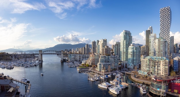 Panoramic Aerial View of Granville Island in False Creek with modern city skyline