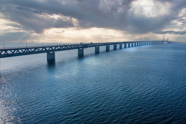 Panoramic aerial view of the Oresundsbron bridge between Denmark and Sweden. Oresund Bridge view at sunset.